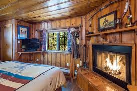 knotty pine paneling and wood floors
