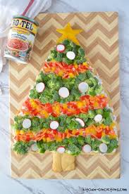 2 cans (8 oz each) pillsbury® refrigerated crescent dinner rolls, 1 pkg (8 oz) cream cheese, softened, 1/2 cup sour cream, 1 teaspoon dried dill weed, 1/8 teaspoon garlic powder, 3 cups finely chopped assorted vegetables. Christmas Tree Veggie Pizza Kitchen Concoctions