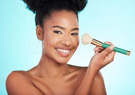 black woman brush and makeup in studio