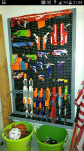 This page is about nerf gun rack diy,contains protect this house,pin on organize,nerf bedroom curtains,diy nerf gun peg board gun rack organizer pin on inspiration made simple. 45f24e0fa20ee9d04b332c646618376e Jpg 720 1 280 Pixels Kids Playroom Diy Toy Storage Boys Playroom
