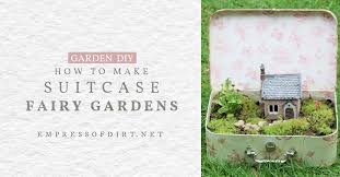 a fairy garden in an old suitcase
