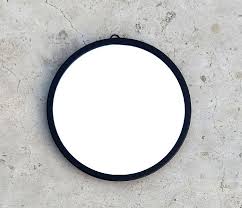 black round wall mirror black round