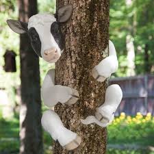 cow tree hugger outdoor tree sculpture