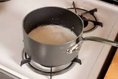 How do you make frothed milk on the stove?