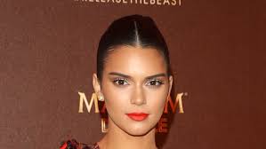 kendall jenner pairs a bright lip with