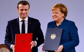French and German leaders deepen relations in extension of symbolic treaty