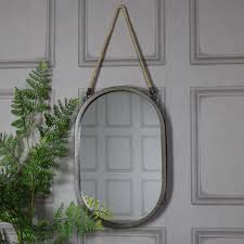 large rustic black oval wall mirror