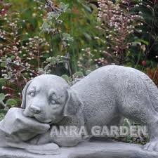 Figure Of A Dog With A Shoe Anra Garden