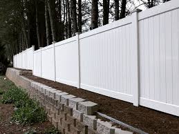 solid privacy vinyl fence installed on