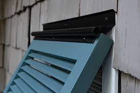 What makes a bahama shutter a bahama shutter is really the fact that the shutter is hinged at the top like an awning. How To Install Bahama Shutters Exterior Bermuda Shutter Installation