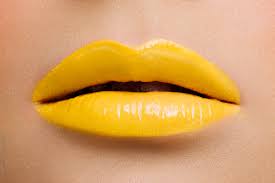 yellow lipstick by stocksy contributor