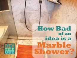 marble shower floor showing dark spots