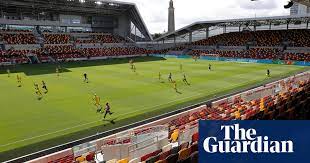 But working as a stadium vendor is still work. Brentford S Futuristic Stadium In Pictures Sport The Guardian