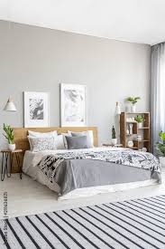 striped carpet in grey bedroom interior