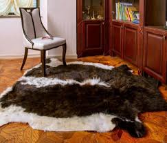brown and white cowhide rug 2 175x200