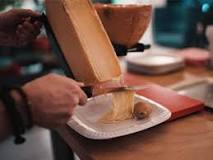 What do the French eat with raclette?