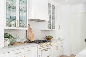 Leaded Glass Cabinets With White Range