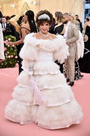Joan henrietta collins is a british actress and author. Joan Collins Went To The 2019 Met Gala As Her Dynasty Character Allure