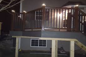 Clam Shell Trex Deck With Trex Transcend Vintage Lantern Railings With Post Cap Lights Grayslake Rock Solid Builders Inc
