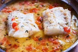 cod with tomato thyme sauce cooking