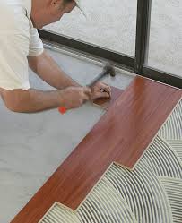 glue wood flooring to a concrete slab