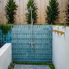 Outdoor showers with a wood base are beautiful and environmentally friendly. 19 Outdoor Shower Ideas