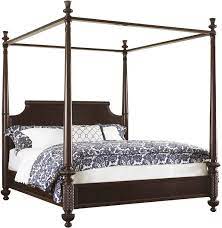 wood canopy bed