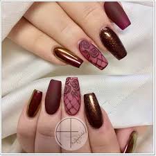 let the burgundy shade unify the diffe designs on your nails one nail may have glitters matte glossy or gel polish but one thing remains the same