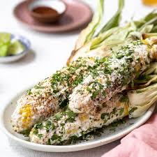 Mexican street corn with chilies, cilantro, and lime. Mexican Street Corn 2 Ways On The Cob Off The Cob Foolproof Living