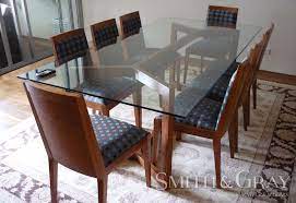 Glass Top Dining Table With Pommle