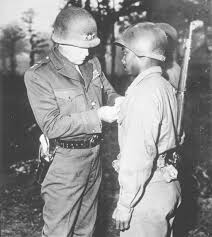 the original black panthers fought in the st tank battalion general george s patton u s third army commander pinning the silver star on