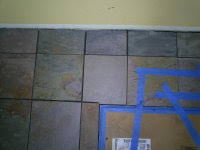 per sq ft to lay ceramic floor tile