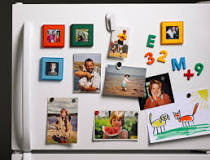 How do you put pictures on a refrigerator?