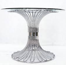 bent chrome pedestal base glass