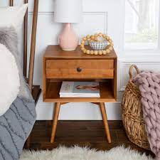 The nightstand is designed to float on the wall, attached to the wall , its a moderately easy install for someone with basic tools. Mid Century 1 Drawer Open Shelf Nightstand Overstock 27148596