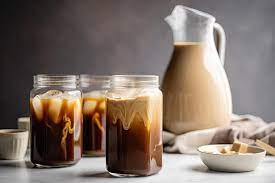 pitcher of iced coffee lattes ready to