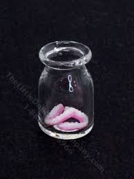 miniature false teeth in jar by truly