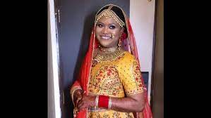 nigerian woman in indian bridal attire