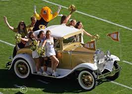 Georgia Tech Cheerleaders and Buzz ride the Ramblin&#39; Wreck onto the field  before the second half kickoff photo - Jerry Pillarelli photos at pbase.com