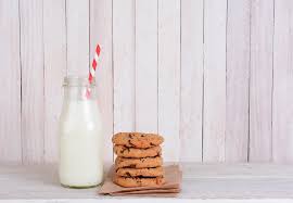 milk bottle straw cookies stock photo