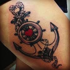 Sketched anchor, wheel, and compass. 58 Anchor Tattoos For Men