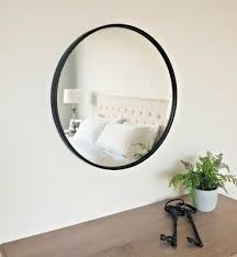 round metal framed wall mirror 70cm
