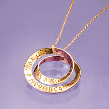 It measures 3/8 the necklace includes an 18 long 14k yellow gold chain and is gift boxed with irish harp and celtic. 14k Gold Irish Blessing Double Mobius Necklace Bas Bleu Um5552