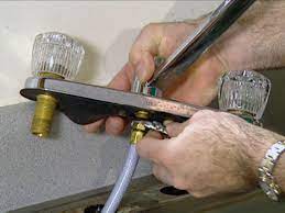 If you're installing a new vanity and sink, it's much easier to mount the faucet before you put the sink in place. How To Install A Single Handle Kitchen Faucet How Tos Diy