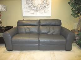 reclining natuzzi leather sofa at the