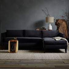 Dark Grey Walls A Black Sofa And Raw