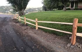 Made popular by farmers in america during the nineteenth century, this type of fence was replaced by the cheaper barbed wire which proved to be more effective. Cedar Split Rail Fence Split Log Fence North Idaho Post And Pole