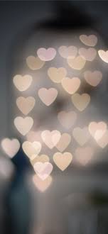 multiple blurry heart shaped lights
