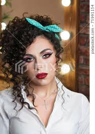 carnival makeup pin up image curly