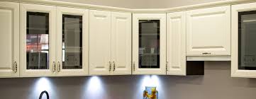 Or, you could always add a glass panel to cabinet doors to open up your cabinets, as this blogger did. Cabinet Refinishing In Raleigh Nc Cabinet Painting